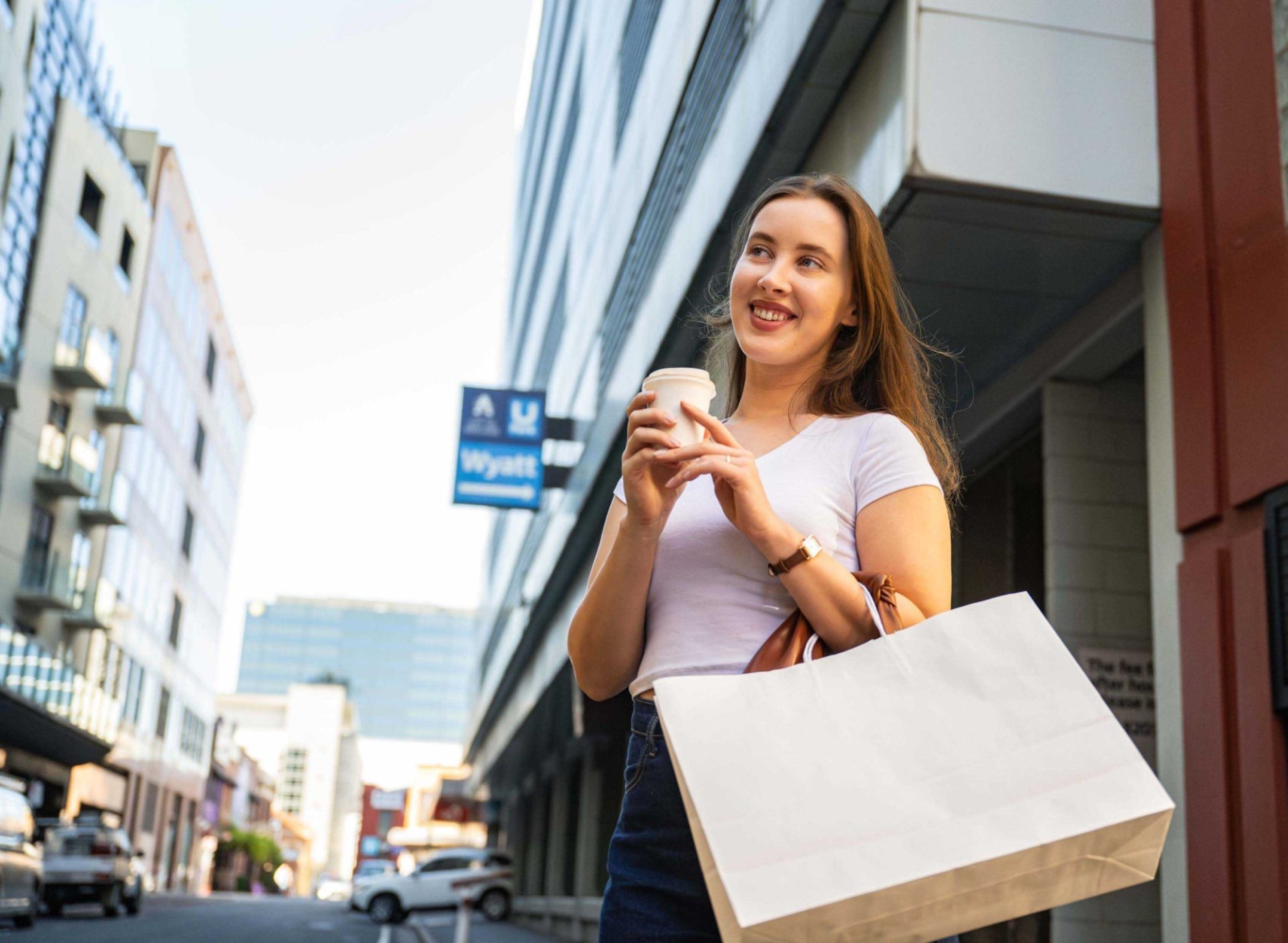 UPark - Woman holding coffee